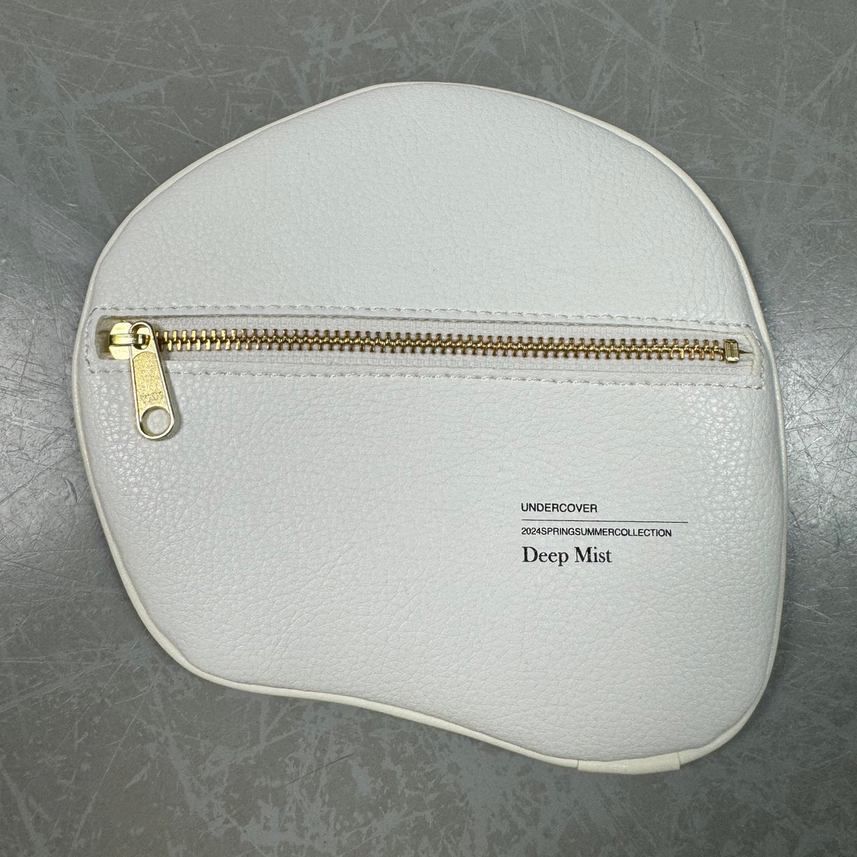 S/S 2024 Undercover “Deep Mist” Faux Leather Skull Pouch image 1